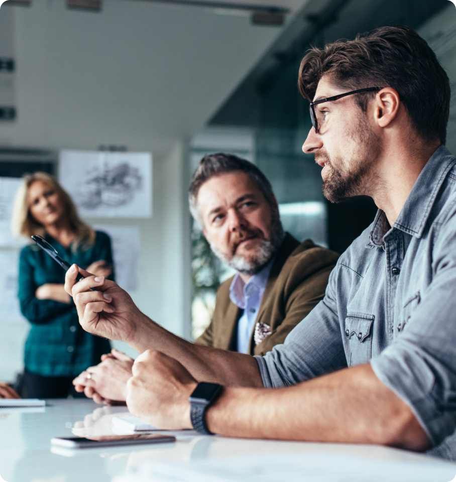 Image depicting healthcare professionals conversing about HealthEdge's Dual Eligible solutions.